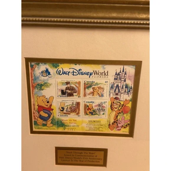 POOH THROUGH THE YEARS COMMEMORATION OF DISNEY WORLDS 25TH ANNIVERSARY COA FRAME